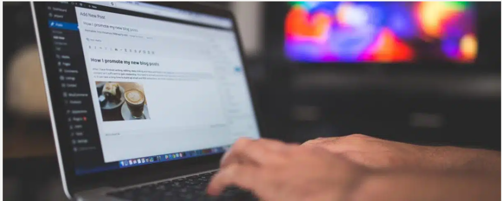 A person typing on a laptop learning SEO content writing for beginners