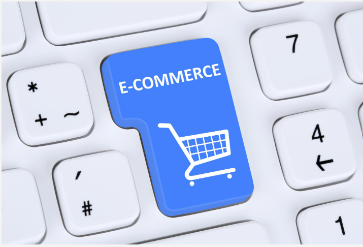 E-commerce keyboard button with shopping cart icon representing online shopping in Pakistan
