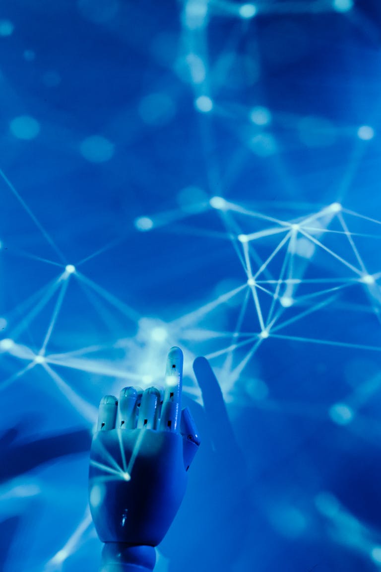 Futuristic robotic hand touching a digital network on blue background representing AI technology guide