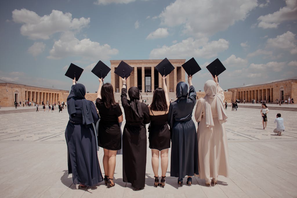 student visa overseas education Pakistan graduating students celebrating