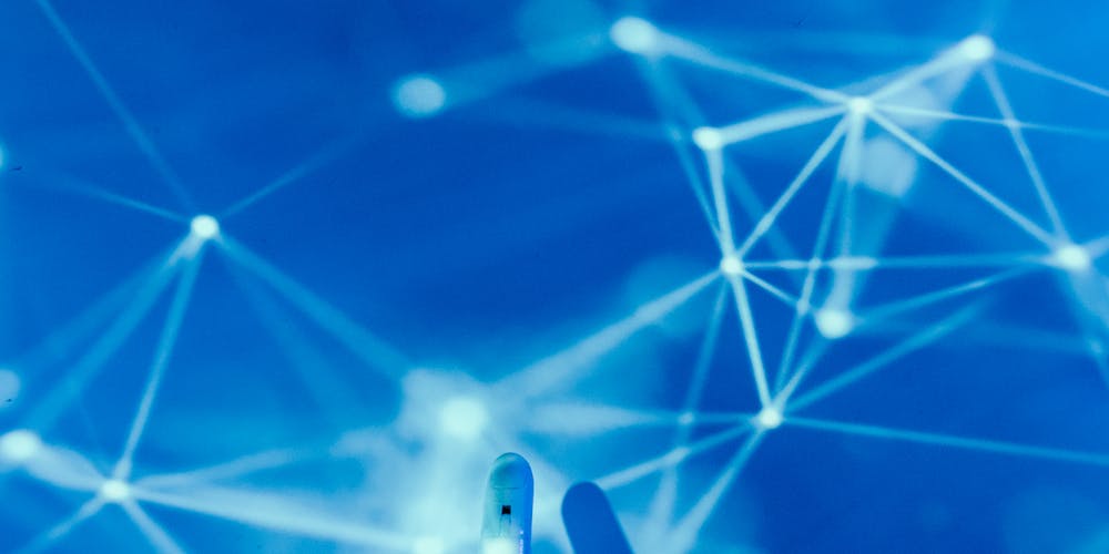 Blue digital geometric network pattern representing artificial intelligence and deep learning technology