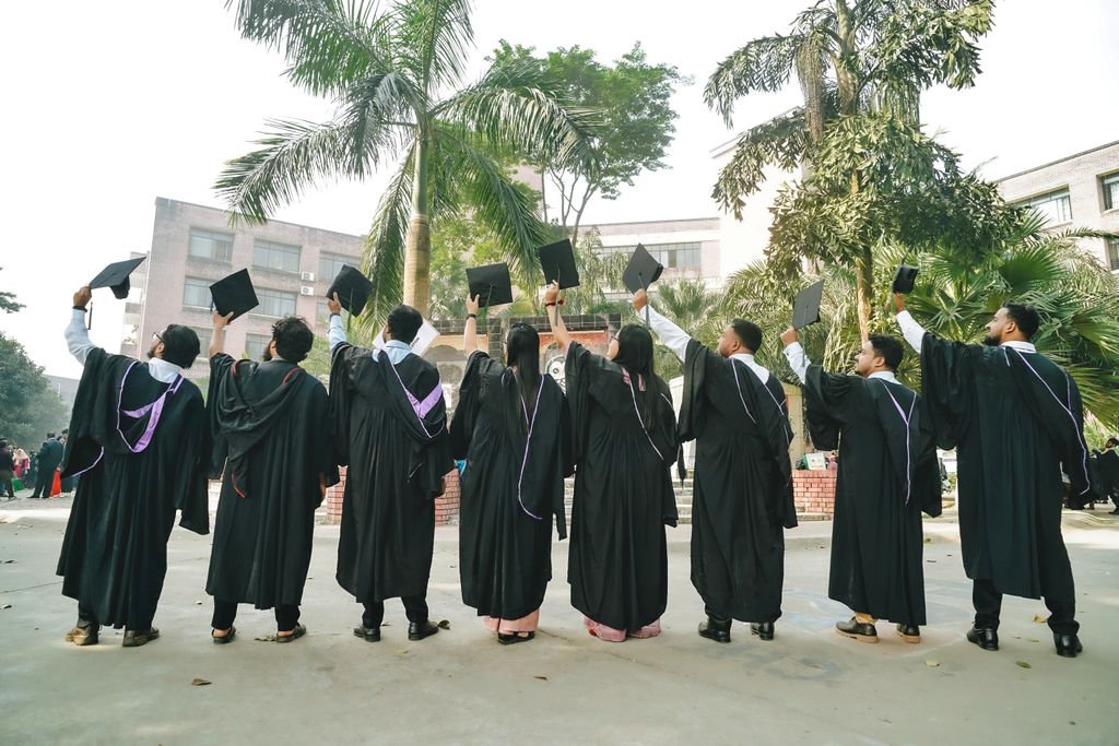 Trending professions in Pakistan graduates celebrating career achievement