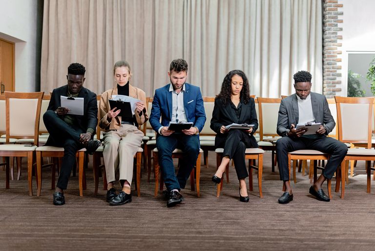 Interview preparation tips - diverse group of professionals in a job interview